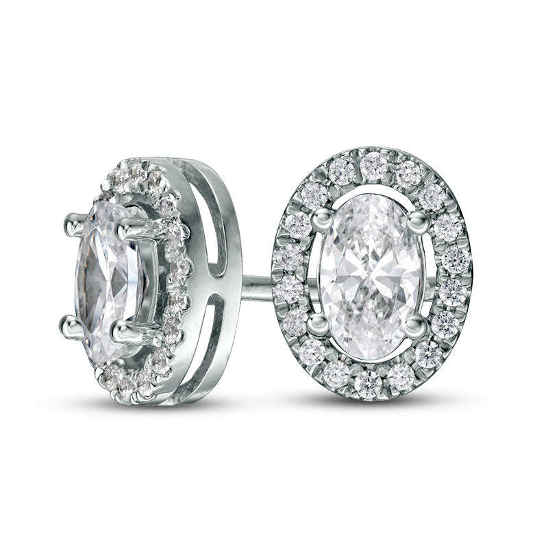 0.5 CT. T.W. Certified Oval Diamond Frame Stud Earrings in 14K White Gold (I/I1)