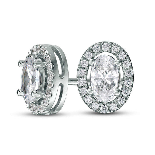 0.5 CT. T.W. Certified Oval Diamond Frame Stud Earrings in 14K White Gold (I/I1)