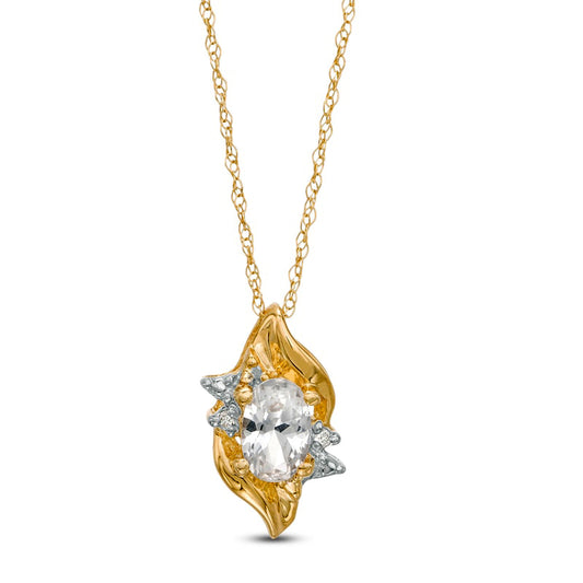 Oval Lab-Created White Sapphire and Diamond Accent Flame Burst Pendant in 10K Yellow Gold