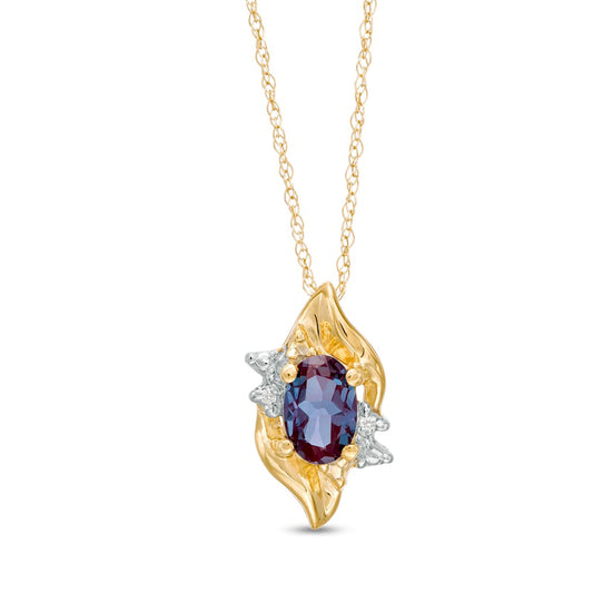 Oval Lab-Created Alexandrite and Diamond Accent Flame Burst Pendant in 10K Yellow Gold