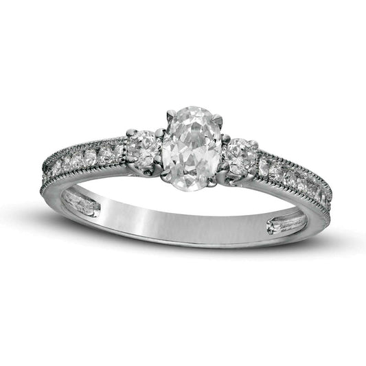 0.88 CT. T.W. Oval and Round Natural Diamond Three Stone Antique Vintage-Style Engagement Ring in Solid 14K White Gold