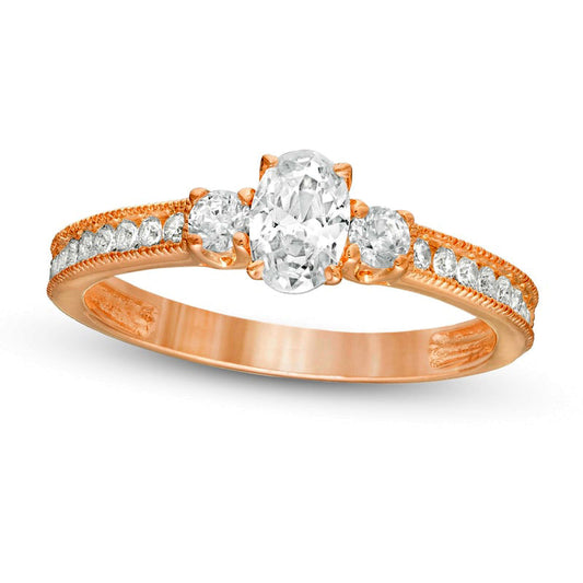 0.88 CT. T.W. Oval and Round Natural Diamond Three Stone Engagement Ring in Solid 14K Rose Gold