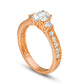 1.17 CT. T.W. Oval and Round Natural Diamond Three Stone Engagement Ring in Solid 14K Rose Gold