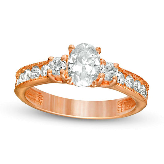 1.33 CT. T.W. Oval and Round Natural Diamond Three Stone Engagement Ring in Solid 14K Rose Gold
