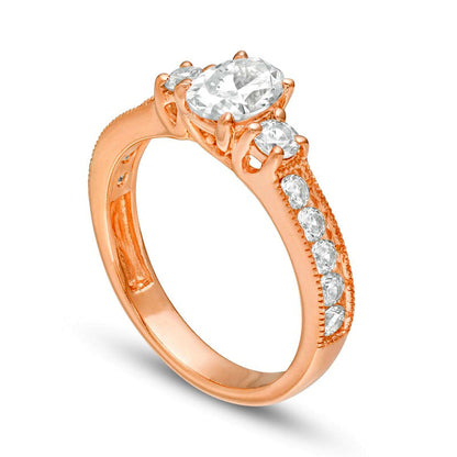 1.33 CT. T.W. Oval and Round Natural Diamond Three Stone Engagement Ring in Solid 14K Rose Gold