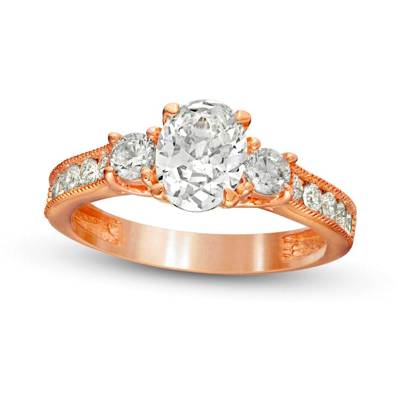 1.75 CT. T.W. Oval and Round Natural Diamond Three Stone Engagement Ring in Solid 14K Rose Gold