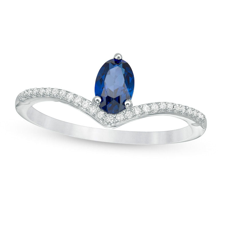 Oval Lab-Created Blue Sapphire and 0.10 CT. T.W. Diamond Chevron Ring in Solid 10K White Gold