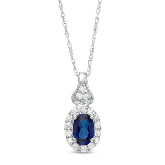 Oval Lab-Created Blue Sapphire and 0.13 CT. T.W. Diamond Frame Pendant in 10K White Gold