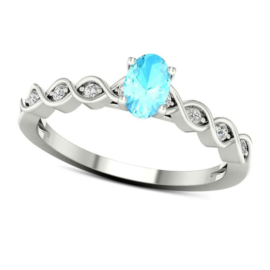 Oval Aquamarine and 0.07 CT. T.W. Natural Diamond Cascading Ribbon Shank Ring in Solid 10K White Gold