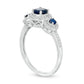 Blue Sapphire and 0.17 CT. T.W. Natural Diamond Frame Three Stone Ring in Solid 10K White Gold