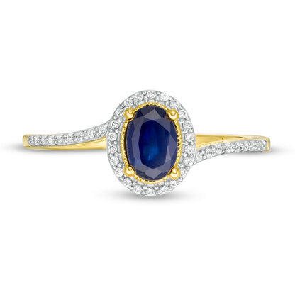 Oval Blue Sapphire and 0.13 CT. T.W. Natural Diamond Frame Bypass Ring in Solid 10K Yellow Gold