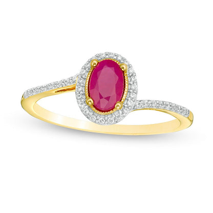 Oval Ruby and 0.13 CT. T.W. Natural Diamond Frame Bypass Ring in Solid 10K Yellow Gold