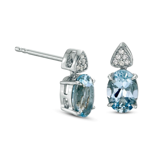 Oval Aquamarine and 0.05 CT. T.W. Triangular Composite Diamond Drop Earrings in 10K White Gold