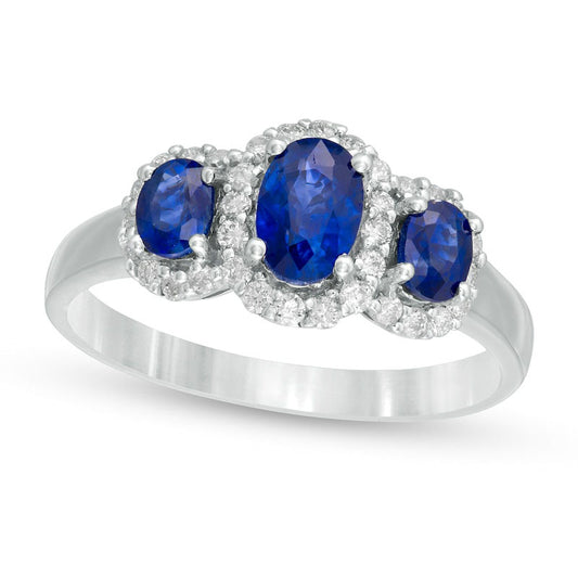 Oval Blue Sapphire and 0.25 CT. T.W. Natural Diamond Frame Three Stone Ring in Solid 14K White Gold