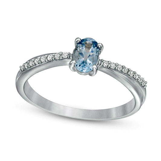 Oval Aquamarine and 0.07 CT. T.W. Natural Diamond Criss-Cross Ring in Solid 10K White Gold