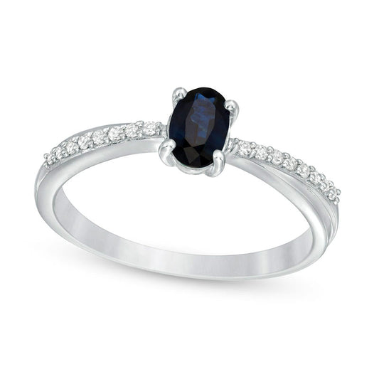 Oval Blue Sapphire and 0.07 CT. T.W. Natural Diamond Criss-Cross Ring in Solid 10K White Gold