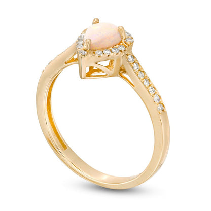 Pear-Shaped Opal and 0.17 CT. T.W. Natural Diamond Frame Ring in Solid 10K Yellow Gold