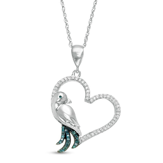0.17 CT. T.W. Enhanced Blue and White Natural Diamond Tilted Heart with Bird Pendant in 10K White Gold