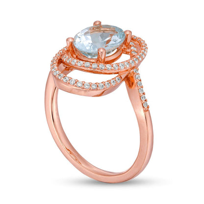 Oval Aquamarine and 0.25 CT. T.W. Natural Diamond Orbit Frame Bypass Shank Ring in Solid 10K Rose Gold