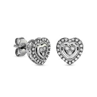 0.1 CT. T.W. Composite Diamond Heart Frame Stud Earrings in Sterling Silver