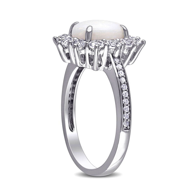 Oval Opal, White Topaz and 0.10 CT. T.W. Natural Diamond Starburst Frame Ring in Sterling Silver