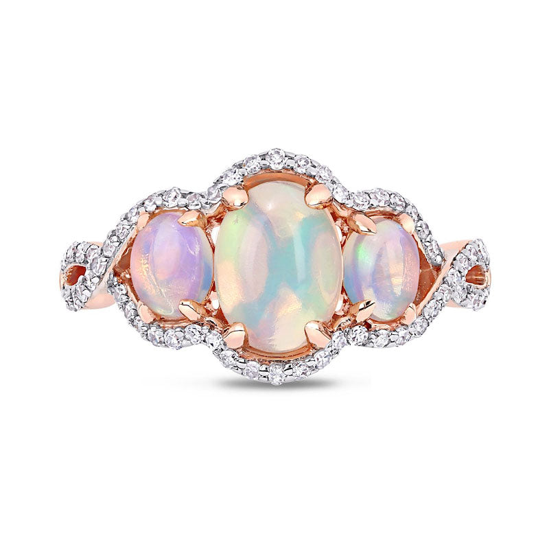 Oval Cabochon Opal and 0.33 CT. T.W. Natural Diamond Frame Three Stone Twist Shank Ring in Solid 10K Rose Gold