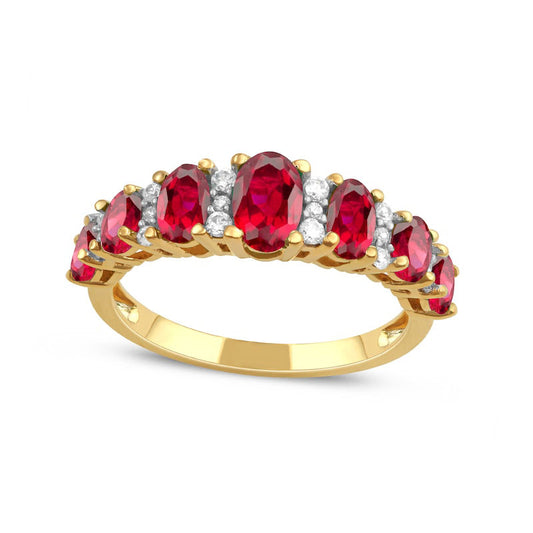 Oval Ruby and 0.17 CT. T.W. Natural Diamond Graduated Seven Stone Alternating Trios Ring in Solid 10K Yellow Gold
