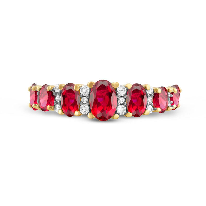 Oval Ruby and 0.17 CT. T.W. Natural Diamond Graduated Seven Stone Alternating Trios Ring in Solid 10K Yellow Gold