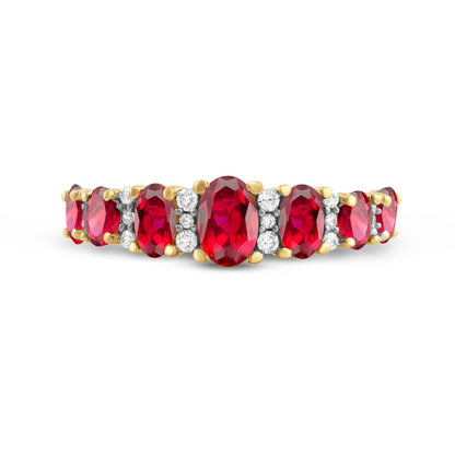 Oval Ruby and 0.17 CT. T.W. Natural Diamond Graduated Seven Stone Alternating Trios Ring in Solid 10K Yellow Gold