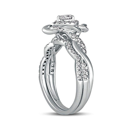 0.63 CT. T.W. Pear-Shaped Natural Diamond Frame Twist Shank Bridal Engagement Ring Set in Solid 10K White Gold