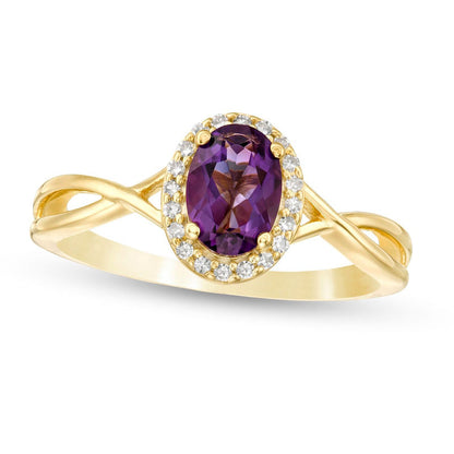 Oval Amethyst and 0.07 CT. T.W. Natural Diamond Frame Twist Shank Ring in Solid 10K Yellow Gold
