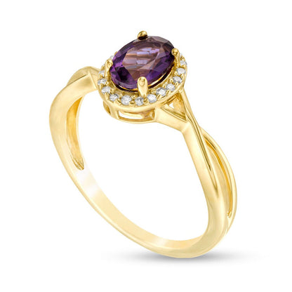 Oval Amethyst and 0.07 CT. T.W. Natural Diamond Frame Twist Shank Ring in Solid 10K Yellow Gold