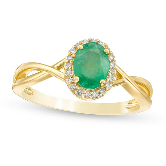 Oval Emerald and 0.07 CT. T.W. Natural Diamond Frame Twist Shank Ring in Solid 10K Yellow Gold