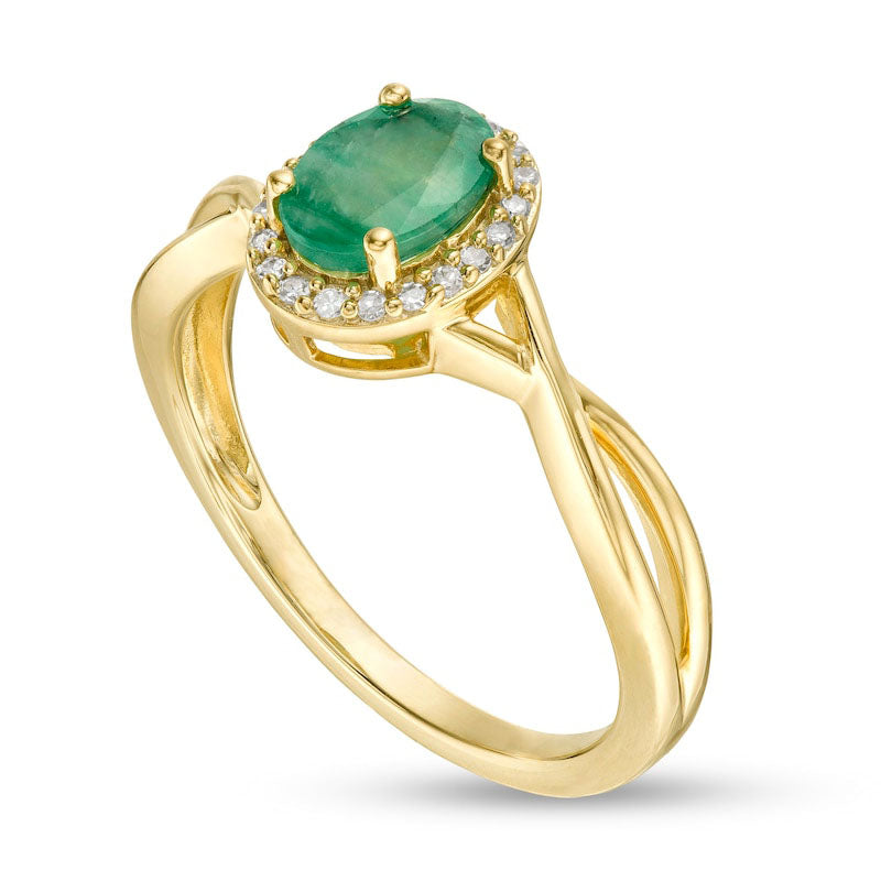 Oval Emerald and 0.07 CT. T.W. Natural Diamond Frame Twist Shank Ring in Solid 10K Yellow Gold