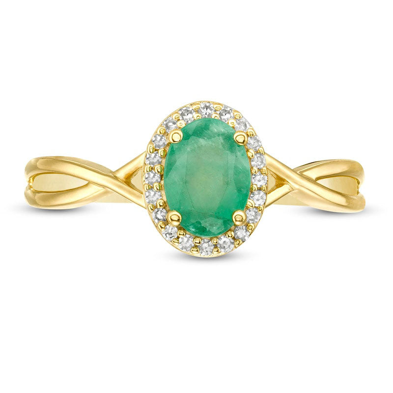 Oval Emerald and 0.07 CT. T.W. Natural Diamond Frame Twist Shank Ring in Solid 10K Yellow Gold