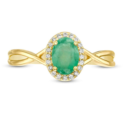 Oval Emerald and 0.07 CT. T.W. Natural Diamond Frame Twist Shank Ring in Solid 10K Yellow Gold