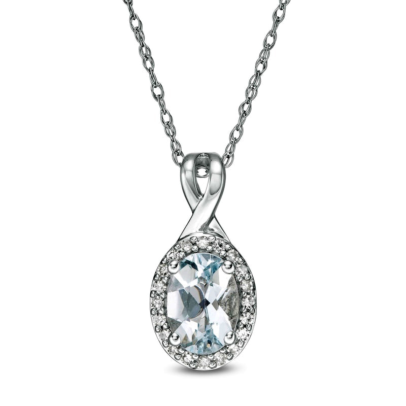 Oval Aquamarine and 0.07 CT. T.W. Natural Diamond Frame Pendant in 10K White Gold