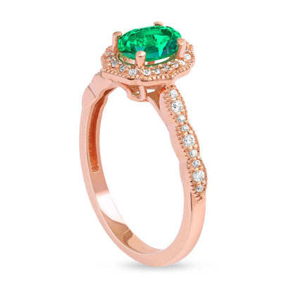 Oval Emerald and 0.17 CT. T.W. Natural Diamond Quatrefoil Frame Antique Vintage-Style Ring in Solid 10K Rose Gold