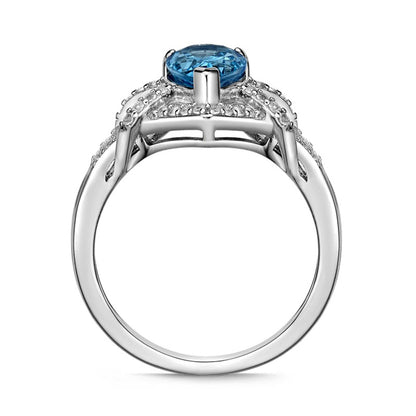 Pear-Shaped Blue and White Topaz Frame Buckle Split Shank Ring in Sterling Silver