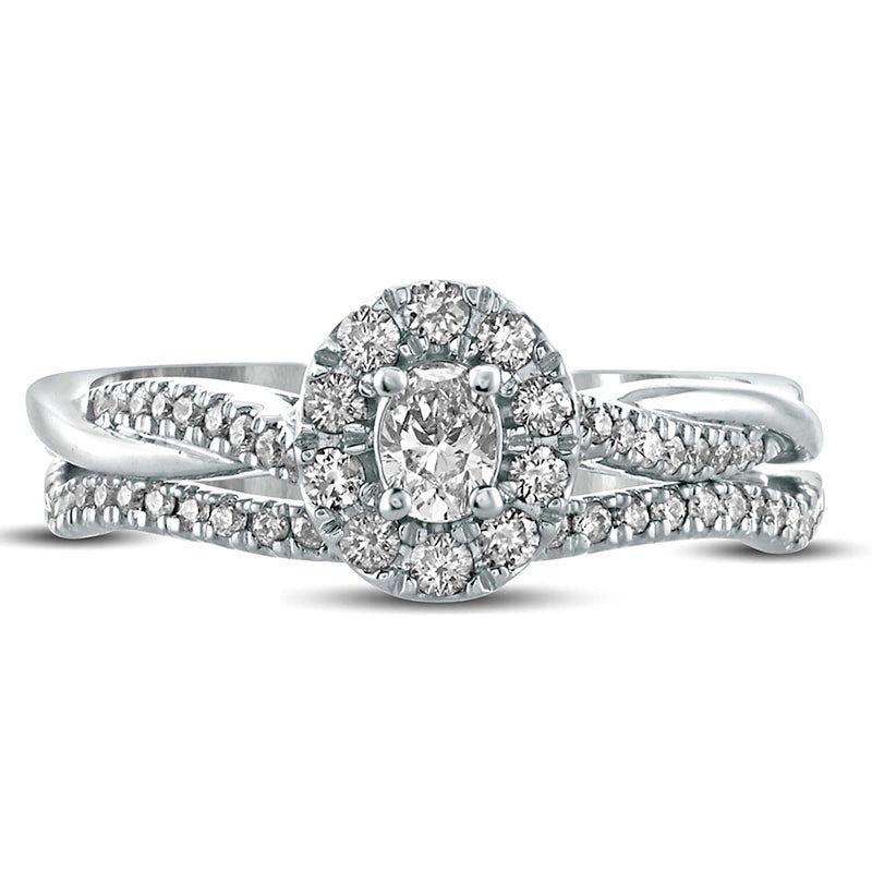 0.50 CT. T.W. Oval Natural Diamond Frame Twist Shank Bridal Engagement Ring Set in Solid 10K White Gold