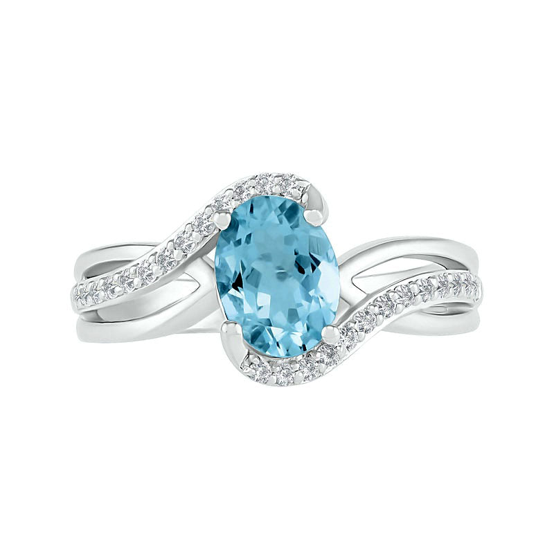 Oval Aquamarine and 0.10 CT. T.W. Natural Diamond Bypass Split Shank Bridal Engagement Ring Set in Sterling Silver