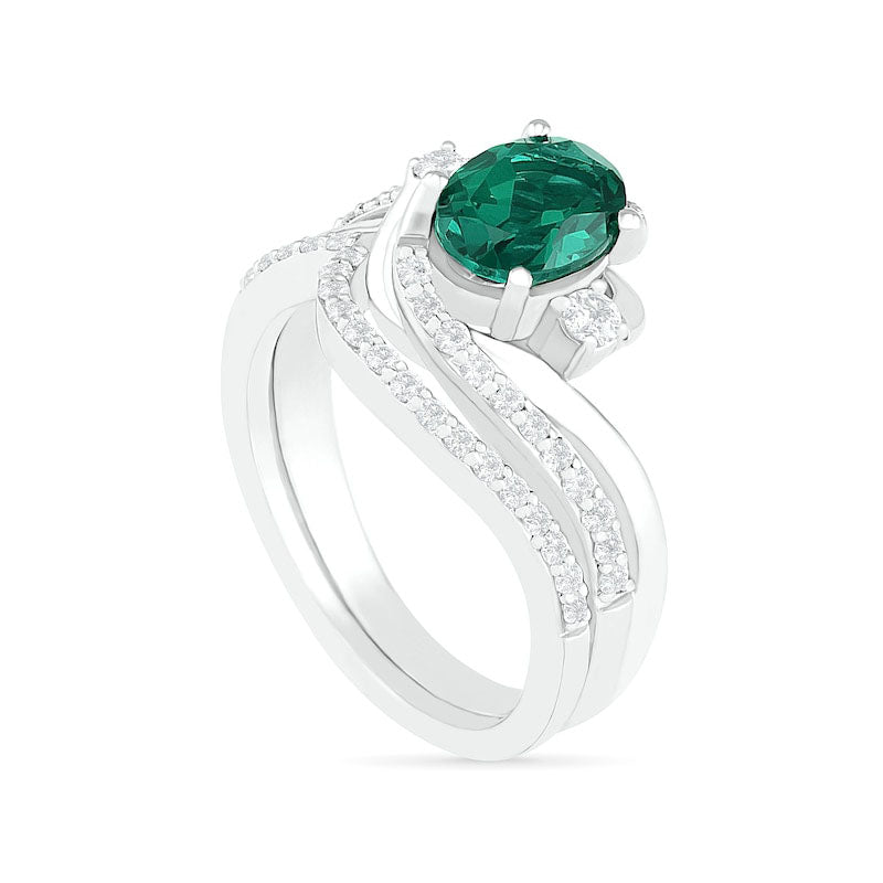 Oval Lab-Created Emerald and White Sapphire Side Accent Double Bypass Split Shank Bridal Engagement Ring Set in Sterling Silver