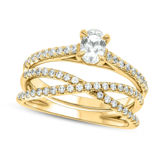 1.0 CT. T.W. Oval Natural Diamond Crossover Bridal Engagement Ring Set in Solid 10K Yellow Gold