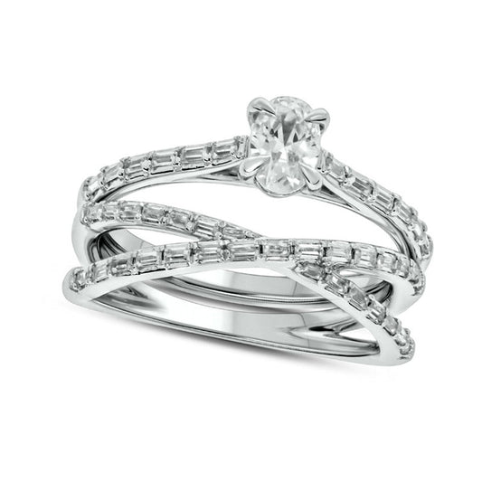 0.75 CT. T.W. Oval and Baguette Natural Diamond Crossover Bridal Engagement Ring Set in Solid 10K White Gold