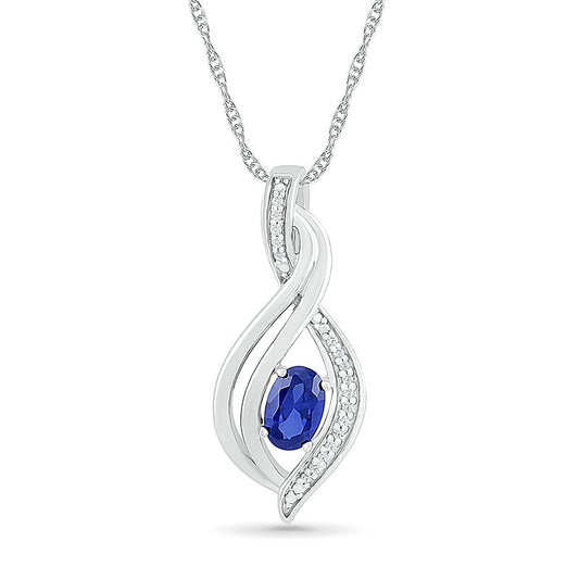 Oval Blue Lab-Created Sapphire and 0.05 CT. T.W. Diamond Flame Drop Pendant in Sterling Silver