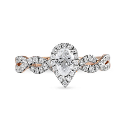 0.75 CT. T.W. Pear-Shaped Natural Diamond Frame Twist Shank Engagement Ring in Solid 10K Rose Gold (I/I1)