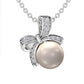 7.0mm Cultured Freshwater Pearl and Natural Diamond Accent Beaded Bow Pendant in Sterling Silver