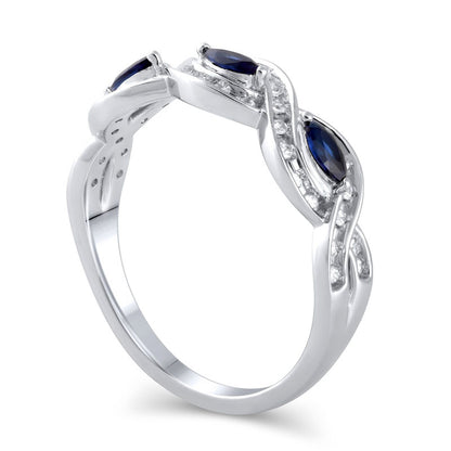 Marquise Blue Sapphire and 0.20 CT. T.W. Natural Diamond Channel-Set Twist Frame Three Stone Split Shank Ring in Solid 10K White Gold