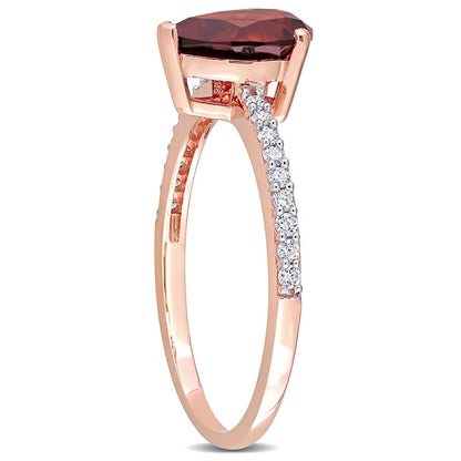 Pear-Shaped Garnet and 0.13 CT. T.W. Natural Diamond Ring in Solid 14K Rose Gold