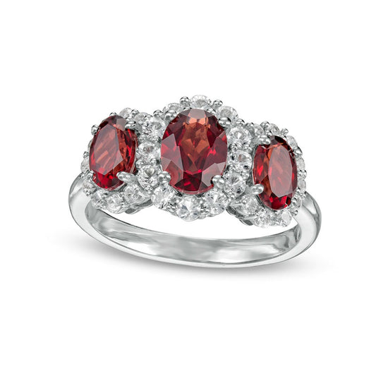 Oval Garnet and White Lab-Created Sapphire Frame Three Stone Ring in Sterling Silver